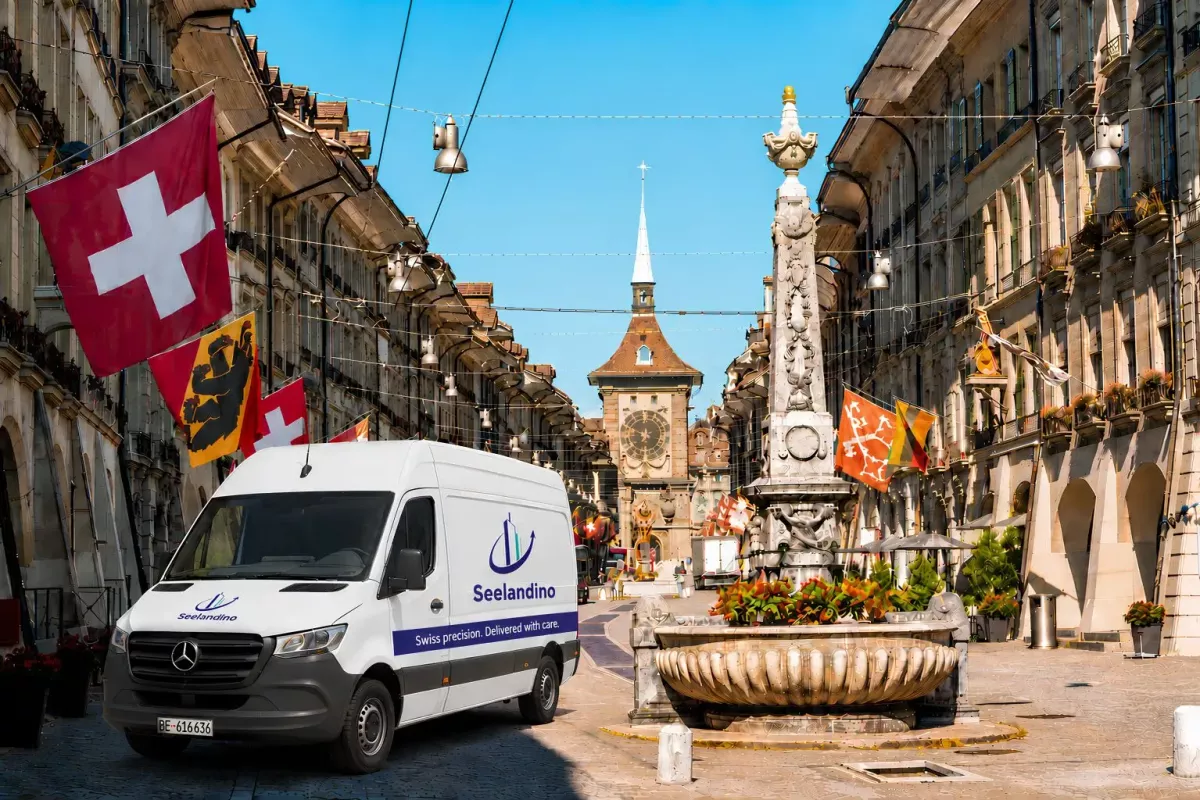 express-kurier-bern-altstadt-lieferung Lieferwagen von Express Kurier bei einer Lieferung in der Berner Altstadt.